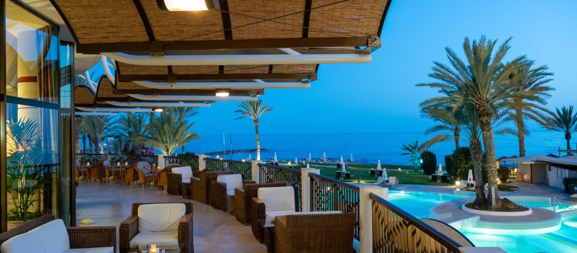 20-ATHENA-BEACH-HOTEL-VERANDA-NIGHT-SHOT-scaled